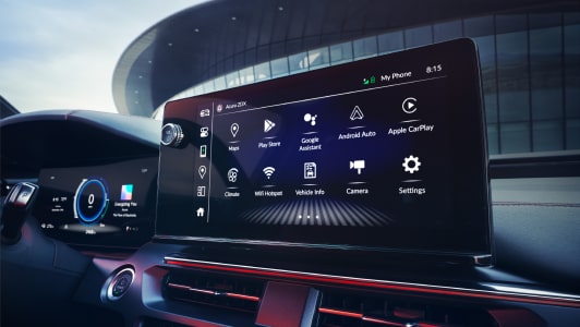 Close-up of the infotainment system in a Acura vehicle displaying Google Built-In