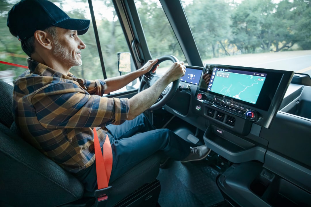 Interior shot of man driving a car