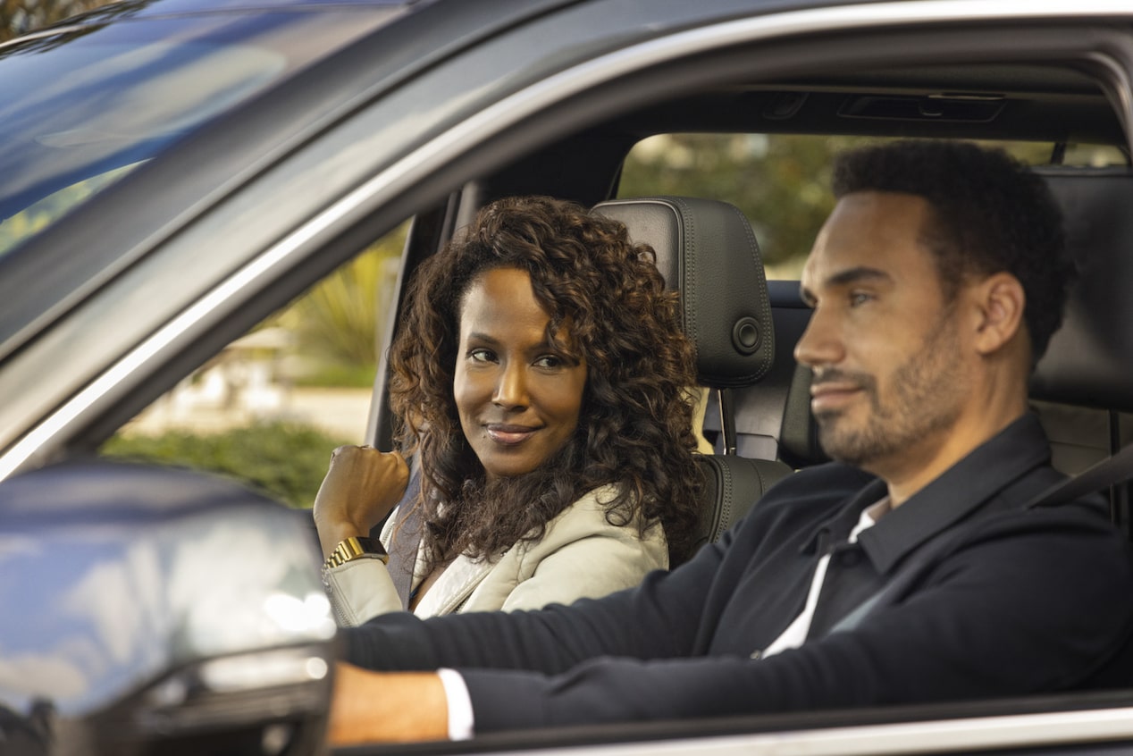 Couple Driving Calmly Together in a Vehicle 