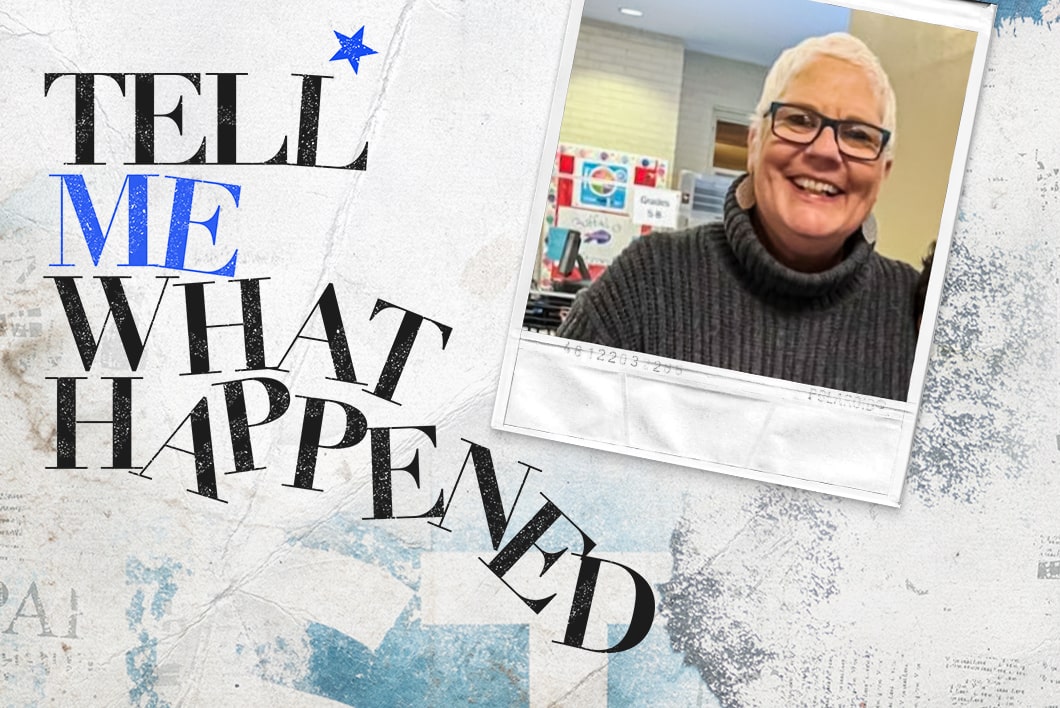 An elderly woman wearing turtleneck and glasses while smiling at the camera next to the text overlay of "Tell Me What Happened".