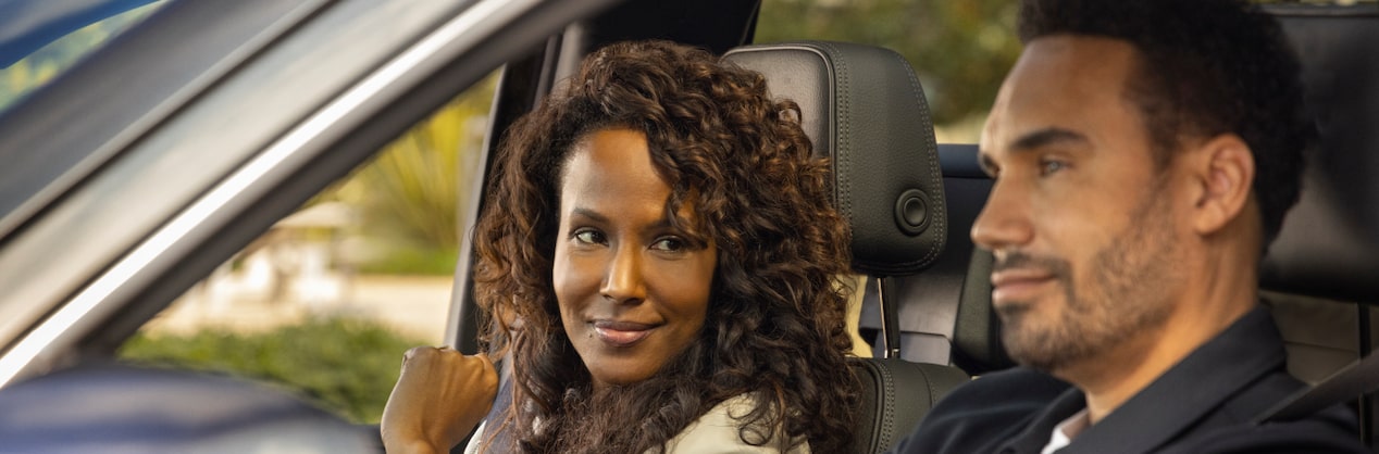 Couple Driving Calmly Together in a Vehicle 