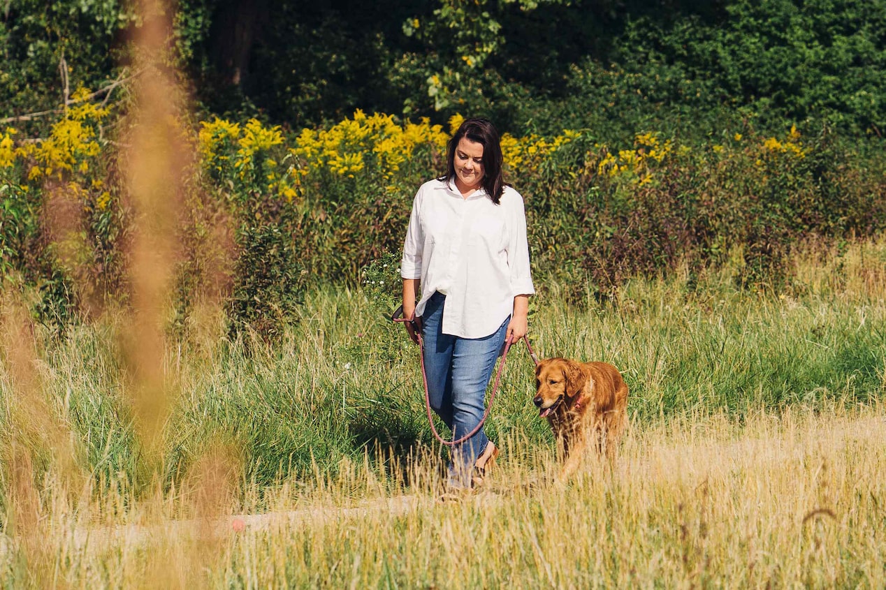 Women walking with dog