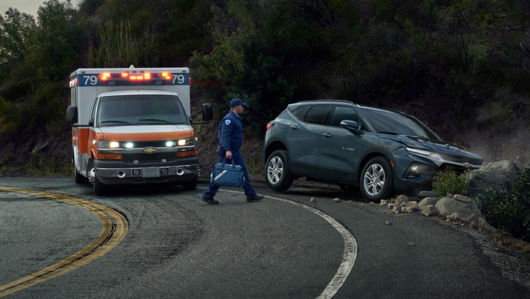 Ambulance Helping SUV in Ditch