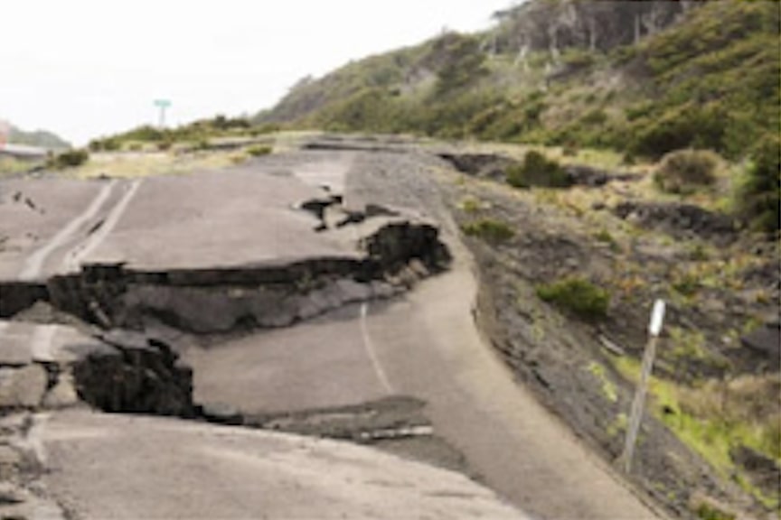 View of an Earthquake Damaged Road Near a Mountain