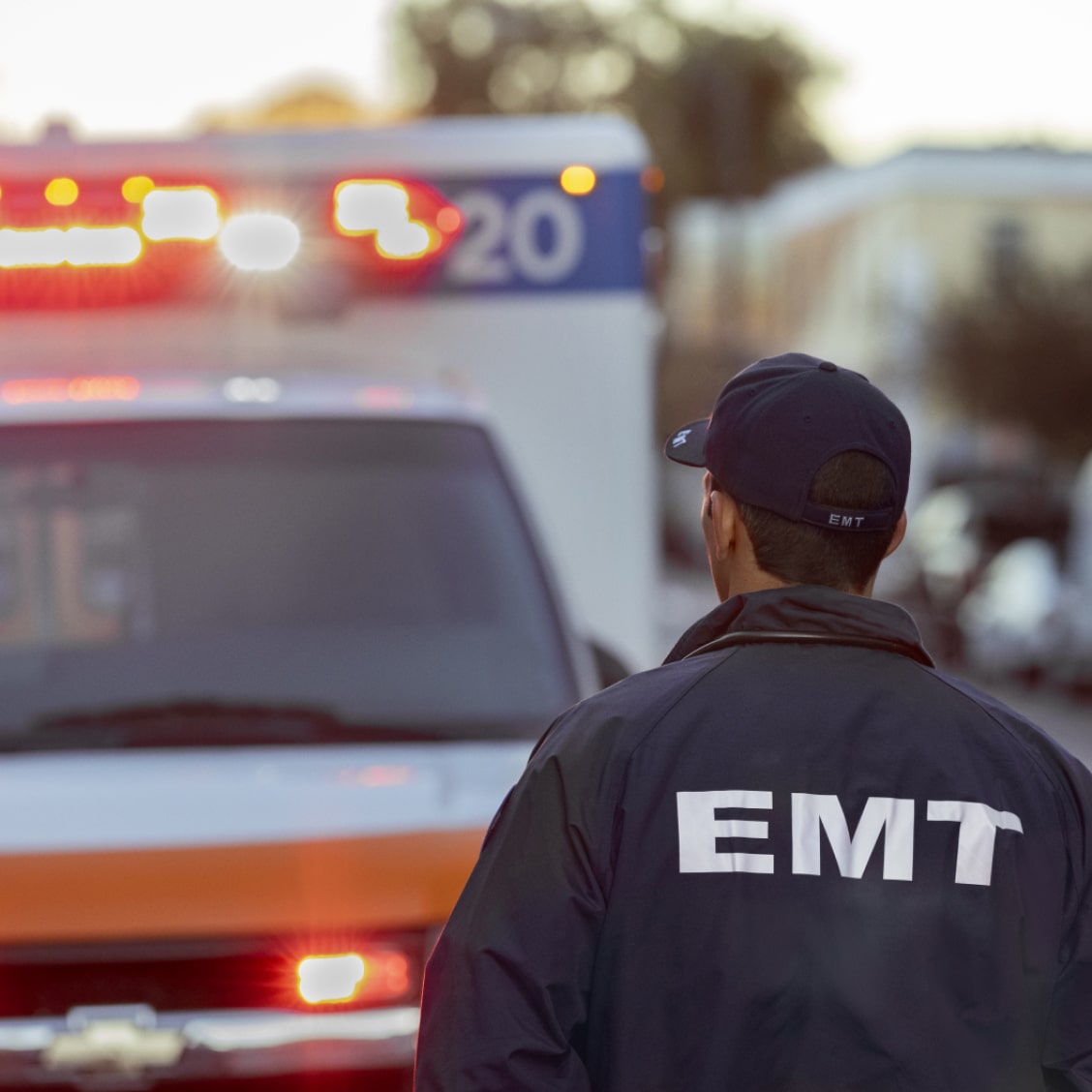 EMT Walking Towards the Drivers Side of His Ambulance