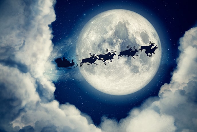 Santa and Reindeer Fly Past Moon and Clouds