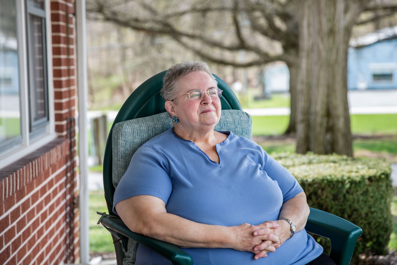 Elderly Women Sitting on Porch 