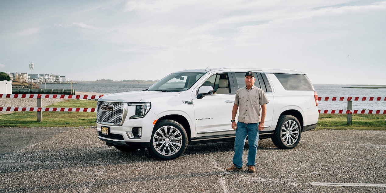 Bruce Dawson in Front of GMC Yukon