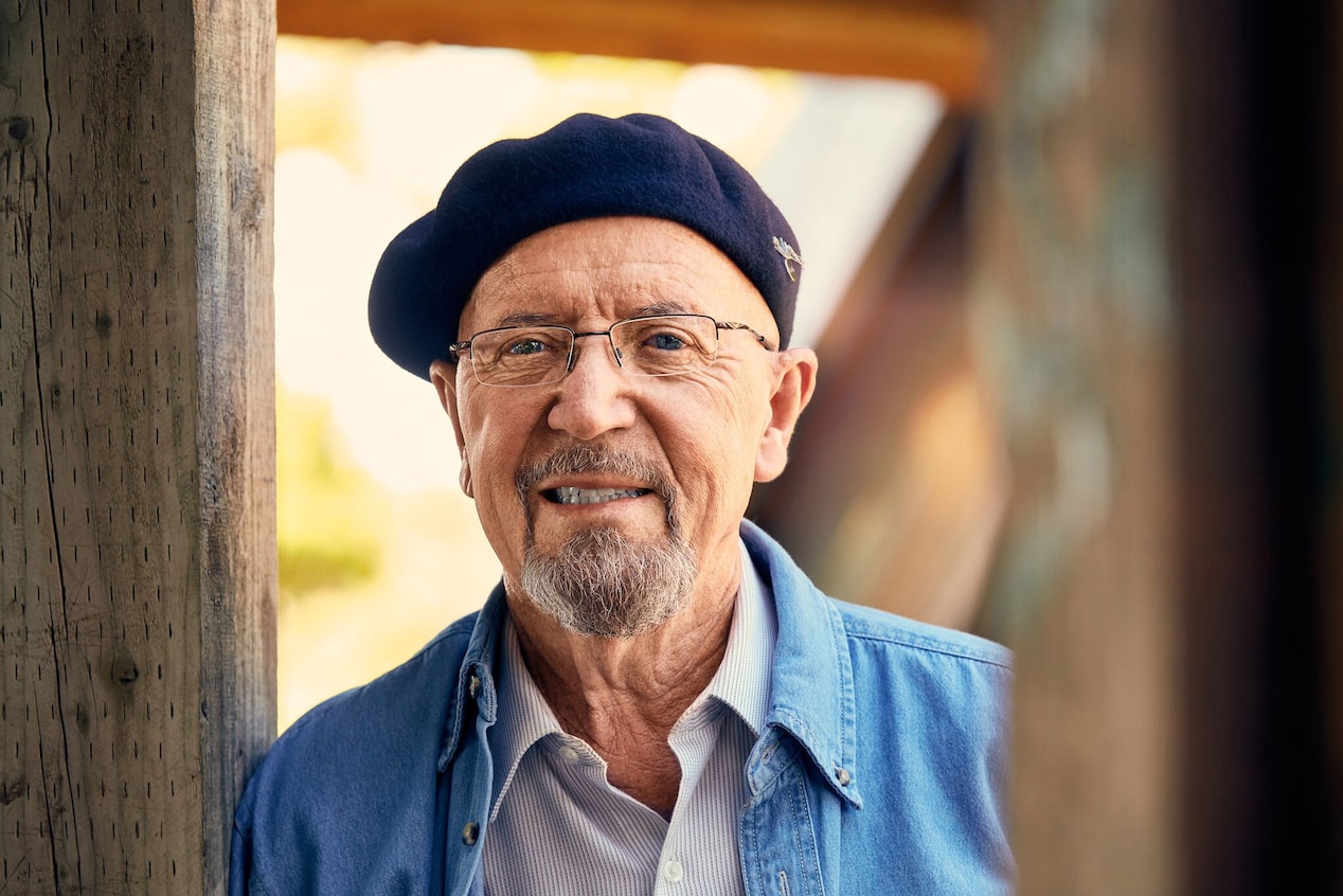 Elderly Man with Glasses Smiling