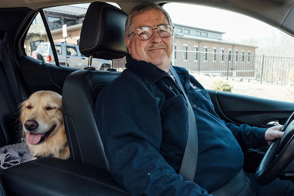 Timothy Kimble and his Dog Riding in his GM Vehicle