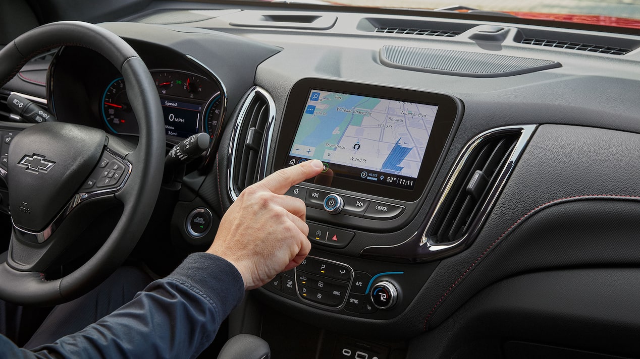 Close-Up of Male Hand Pressing the Infotainment Screen