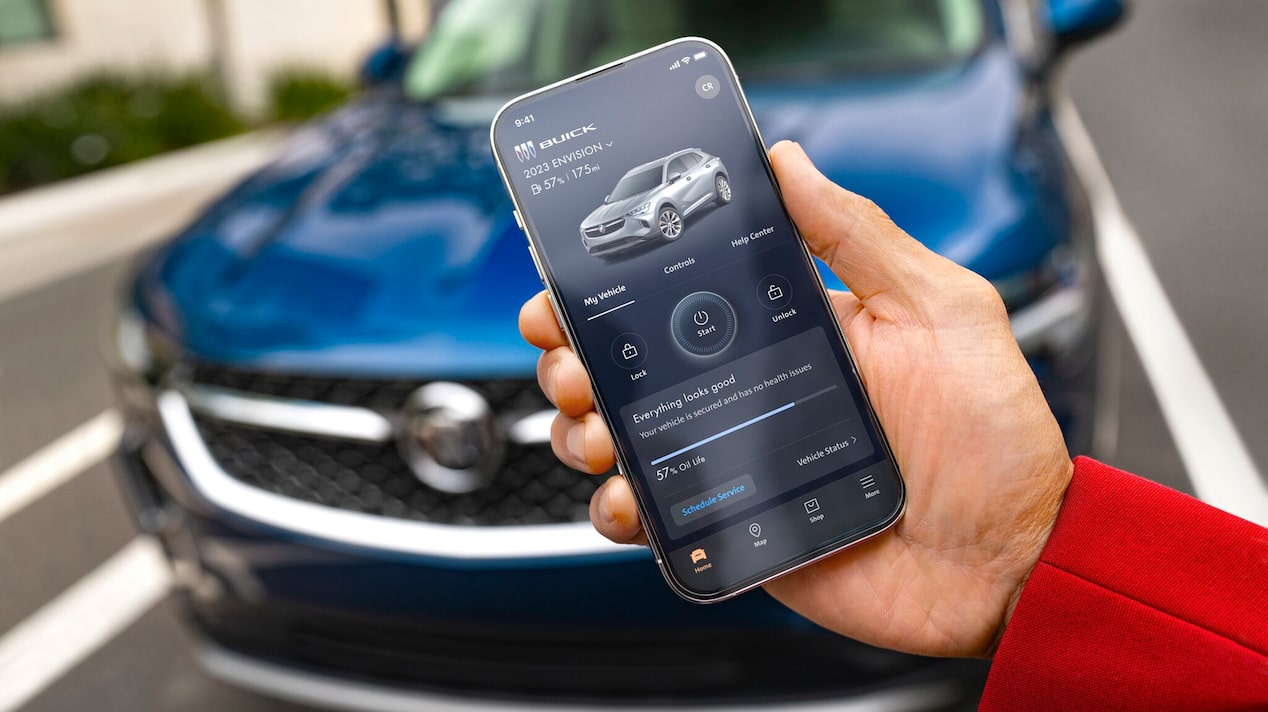 A Woman Checks the Status of her Cadillac Using her Mobile App