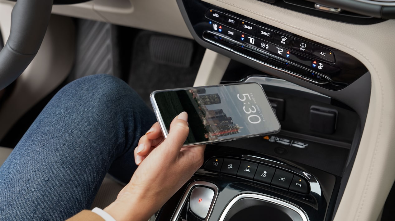 Driver Placing Locked Phone in the Center Console of the Vehicle