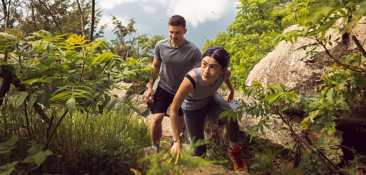 Couple Hikes Through Beautiful Mountains