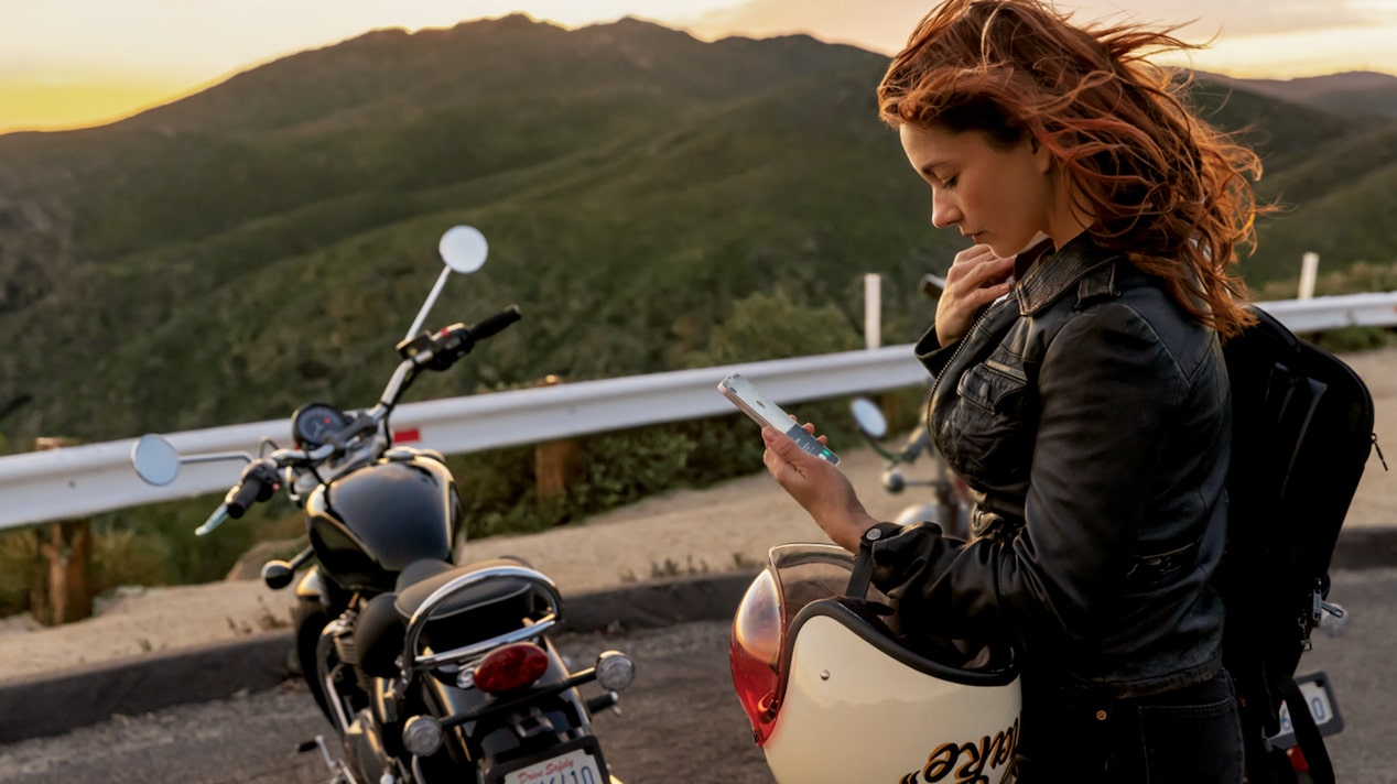 Motorcyclist Stops at a Beautiful View to Check Phone