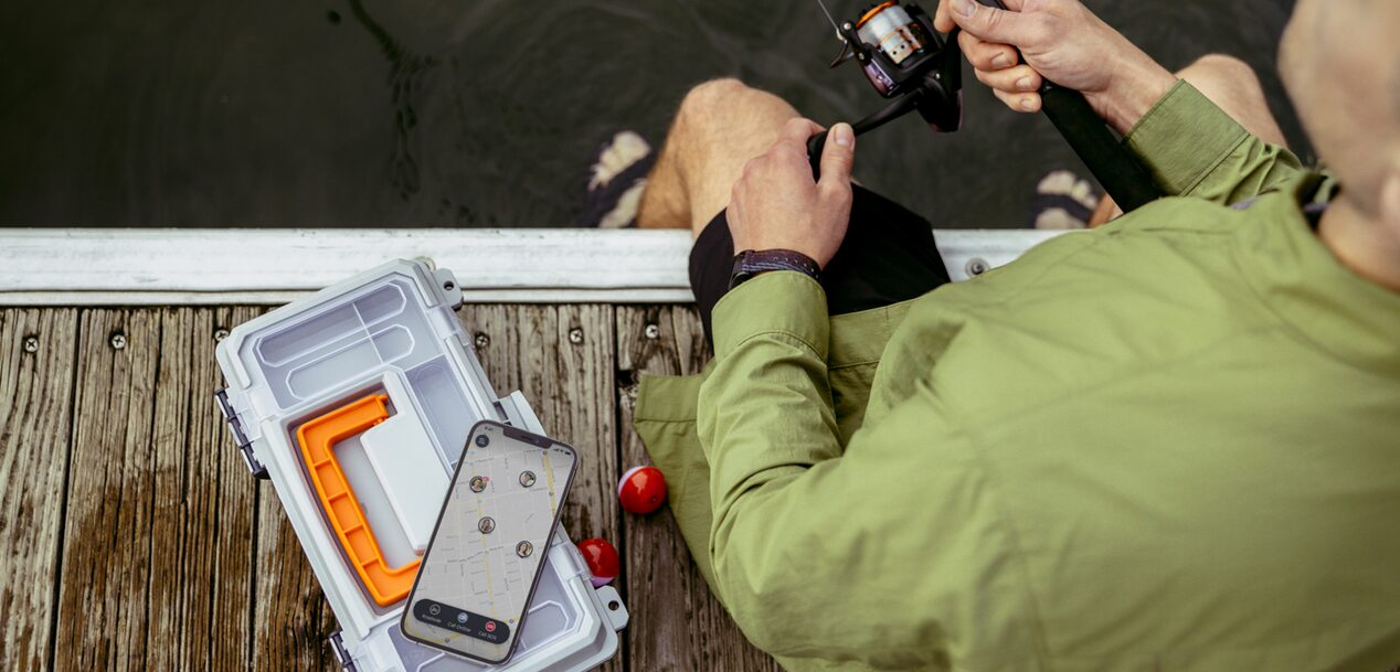 Fisherman Has OnStar Guardian App Open on his Phone