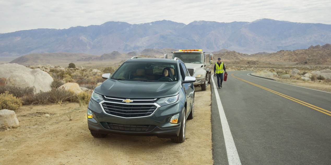 Roadside Assistance Helping Chevy SUV in the Sandy Mountains