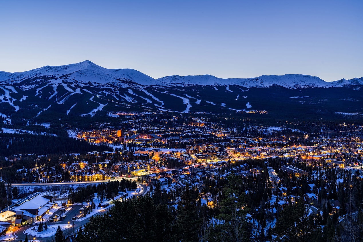 Snowy Mountain Town All Lit Up For Christmas