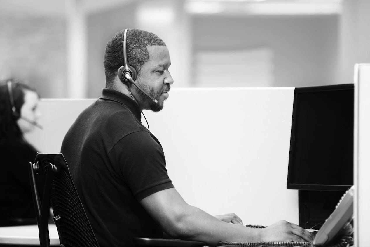 Black & White Photo of an OnStar Advisor Working