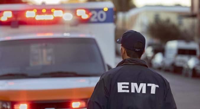 EMT Walking Towards an Ambulance